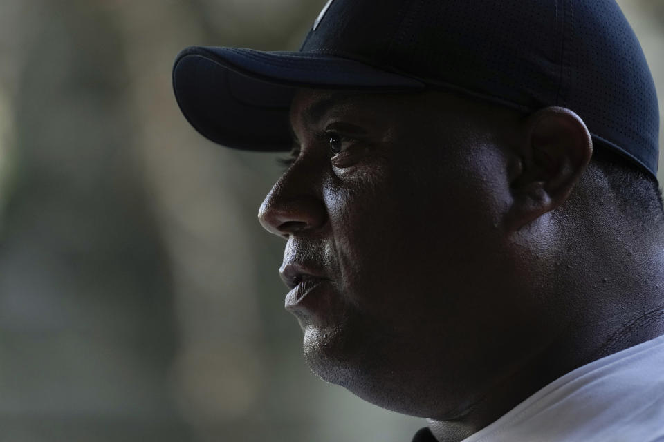 A delegate of the gang '"Los Shottas," who spoke on condition of using his nom de guerre, Jeronimo, gives an interview in Buenaventura, Colombia, Wednesday, Aug. 16, 2023. Jeronimo said its leaders are open to peace, but would not say whether they would be willing to end all illegal activities, only that they’d reduce extortion, looting and clashes. (AP Photo/Fernando Vergara)