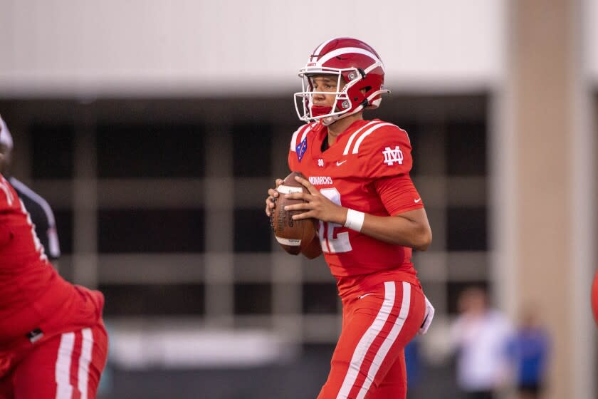 Duncanville, TX - August 27: Mater Dei Monarchs quarterback Elijah Brown (12) during the game against the Duncanville Panthers during the game in Panther Stadium on Friday, Aug. 27, 2021 in Duncanville, TX. (Jerome Miron / For the LA Times)