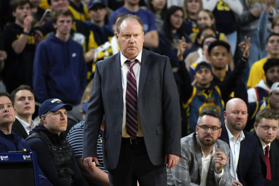 Wisconsin head coach Greg Gard watches against Michigan in the second half of an NCAA college basketball game in Ann Arbor, Mich., Wednesday, Feb. 7, 2024. (AP Photo/Paul Sancya)