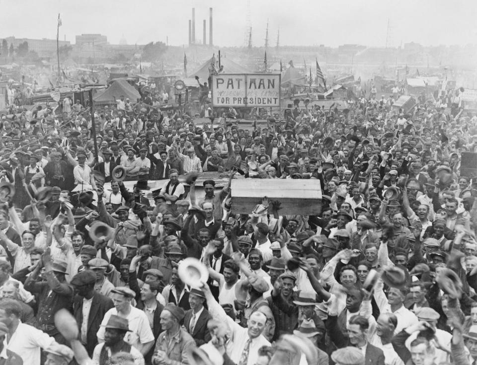 In this June 16, 1932, photograph, thousands of Bonus Army demonstrators are cheering for U.S. Rep. Wright Patman, who demanded immediate payment of their promised bonuses. <a href="https://www.gettyimages.com/detail/news-photo/the-bonus-army-a-demonstration-largely-made-up-of-world-war-news-photo/1243625943?phrase=bonus%20army&adppopup=true" rel="nofollow noopener" target="_blank" data-ylk="slk:FPG/Archive Photos/Getty Images;elm:context_link;itc:0;sec:content-canvas" class="link ">FPG/Archive Photos/Getty Images</a>