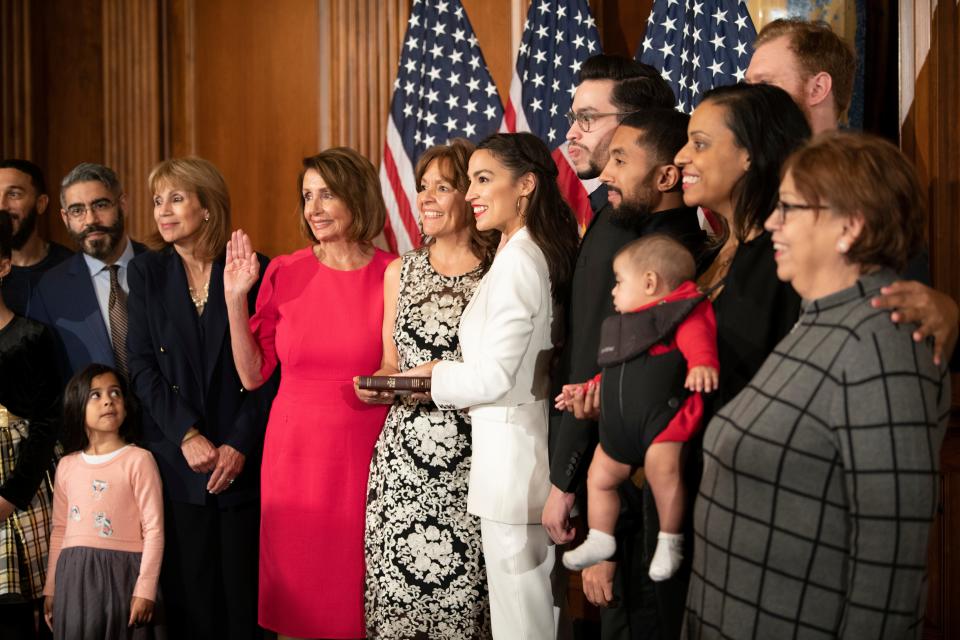 House Speaker Nancy Pelosi swears in Rep. Alexandria Ocasio-Cortez , D-N.Y., on Jan. 3, 2019 at the U.S. Capitol in Washington, D.C.