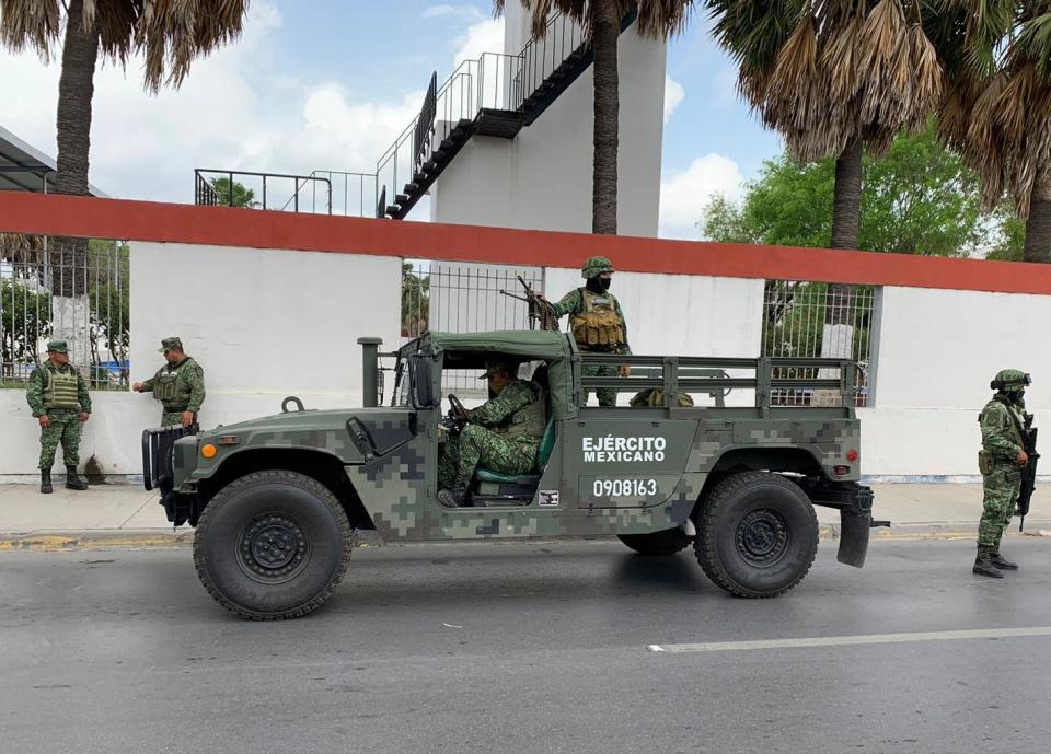 Mexican army soldiers prepare a search mission for four U.S. citizens kidnapped by gunmen at Matamoros, Mexico, on March 6, 2023.