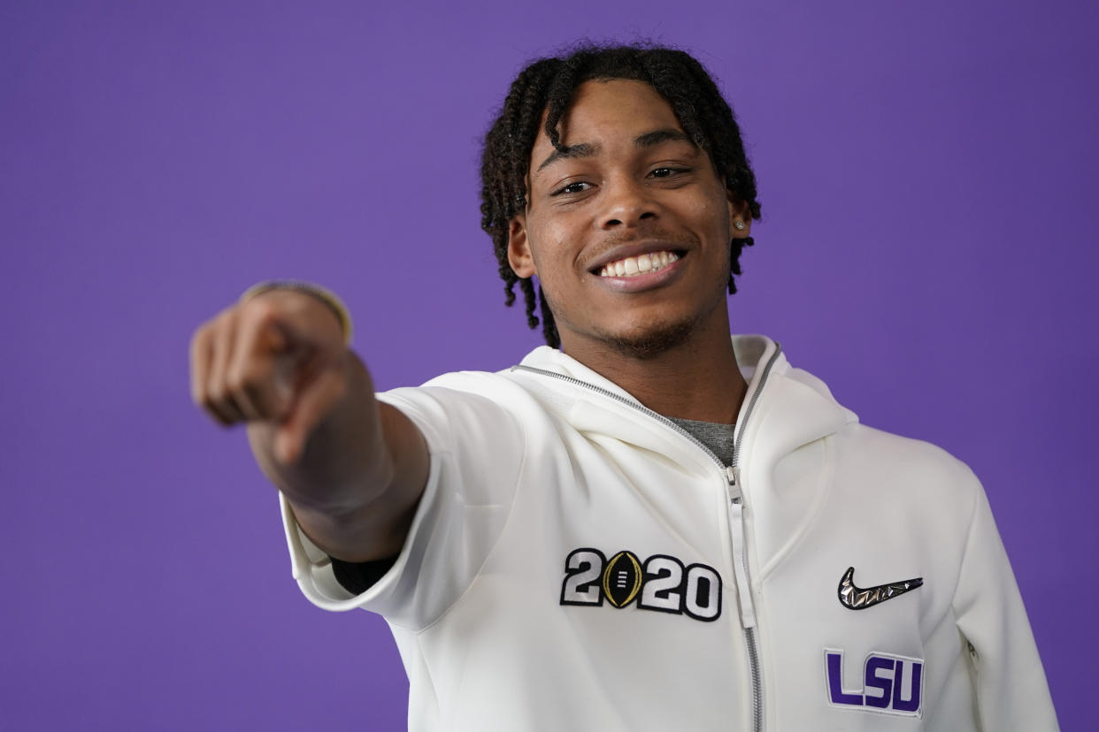 LSU wide receiver Justin Jefferson poses during media day for NCAA College Football Playoff national championship game Saturday, Jan. 11, 2020, in New Orleans. Clemson is scheduled to play LSU on Monday. (AP Photo/David J. Phillip).