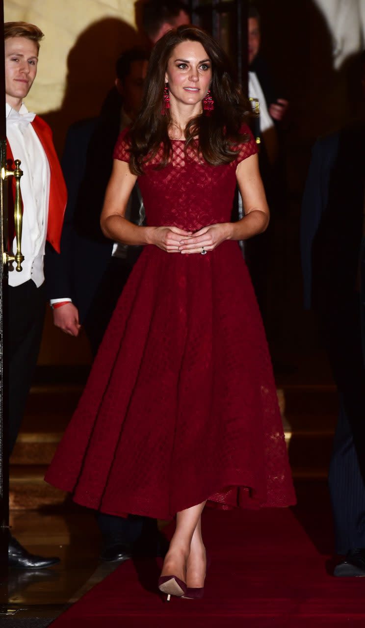 <i>Kate wore a wine red look for a trip to the West End [Photo: PA]</i>