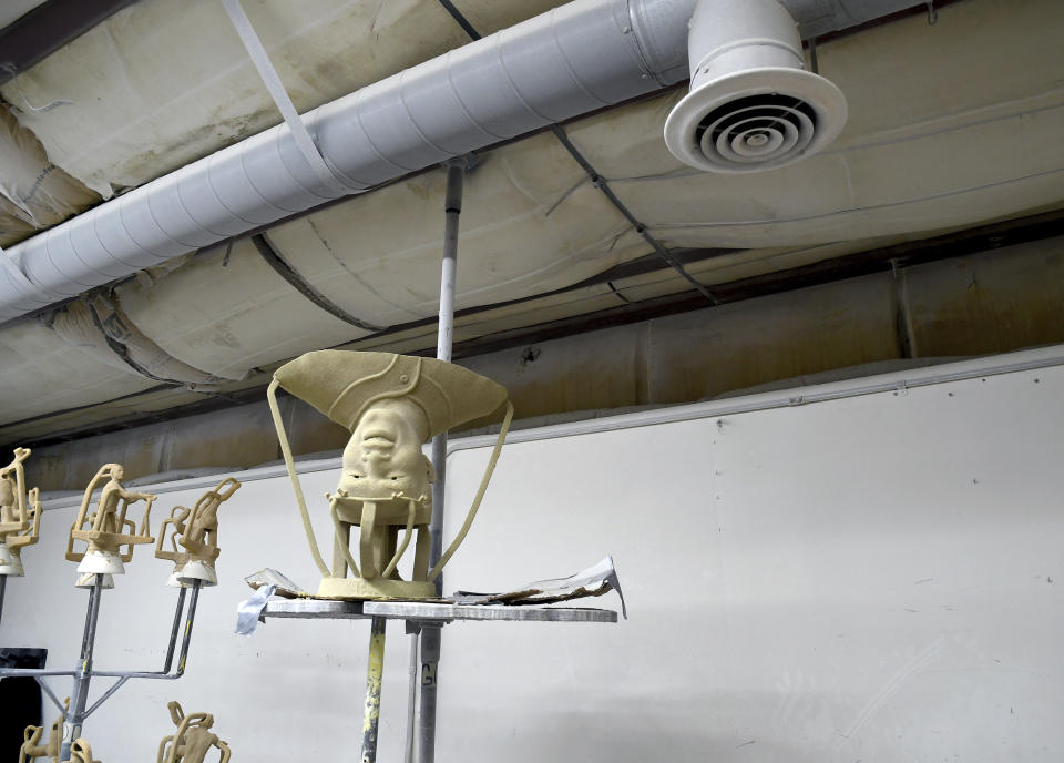 A hard shell mold of Jackie Robinson's head dries at Art Castings of Colorado in Loveland, Colo. on Wednesday, May 8, 2024. The original statue was cut off at the ankles and stolen from a park in Wichita, Kansas in January. The Colorado foundry cast that sculpture in 2019 and, luckily, still had the original plaster and rubber molds. (AP Photo/Thomas Peipert)