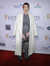 <p>The actress chose a grey jumpsuit with a tailored coat draped over her shoulders for the BAFTA Tea Party. <em>[Photo: Getty]</em> </p>