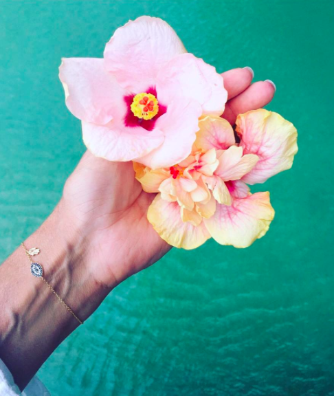 She communed with nature. “A flower does not compete with the flower next to it, IT JUST BLOOMS,” she wrote. (Photo: Instagram)