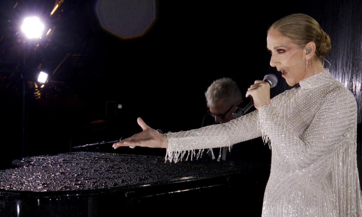 <span>Céline Dion performing on the Eiffel Tower during the opening ceremony of the Paris 2024 Olympics.</span><span>Photograph: Olympic Broadcasting Services/AFP/Getty Images</span>