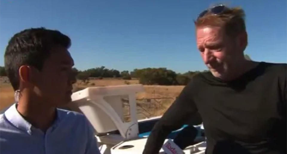 Nine reporter Kamin Gock speaks with a man in Baldivis.