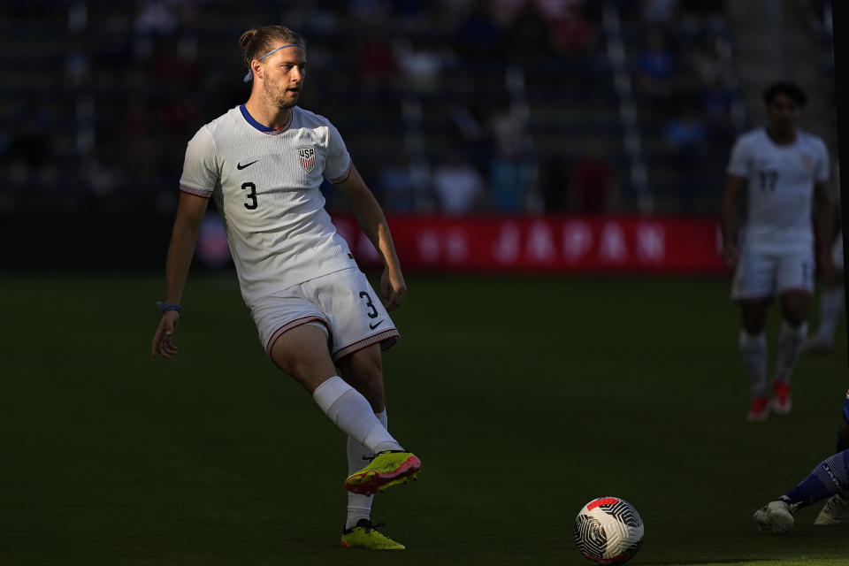 United States defender Walker Zimmerman (3) passes the ball during the first half of an international friendly under-23 soccer match against Japan Tuesday, June 11, 2024, in Kansas City, Kan. (AP Photo/Charlie Riedel)