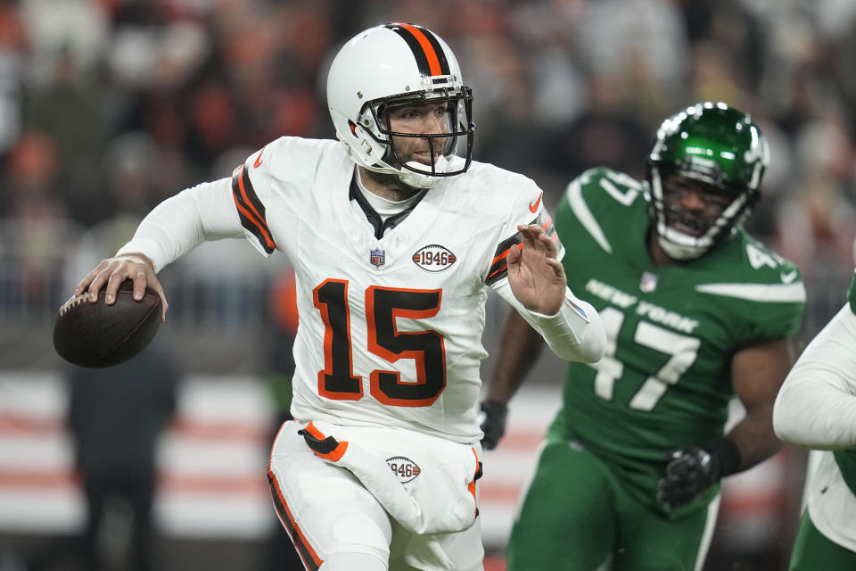 FILE - Cleveland Browns quarterback Joe Flacco scrambles against the New York Jets during the first half of an NFL football game Thursday, Dec. 28, 2023, in Cleveland. As Cleveland's quarterback and his new-ish teammates prepare for Saturday's wild-card game in Houston, Flacco's experience — and success — on the road in the postseason is giving the Browns (11-6) an extra boost of confidence. (AP Photo/Sue Ogrocki, File)