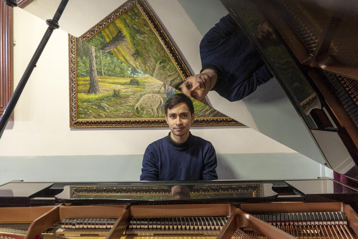 Pianist Arson Fahim, 21, left Kabul for the U.S. just 2 weeks before the Taliban took over the Afghan capital to study music in the U.S.  (Isabela Balena )