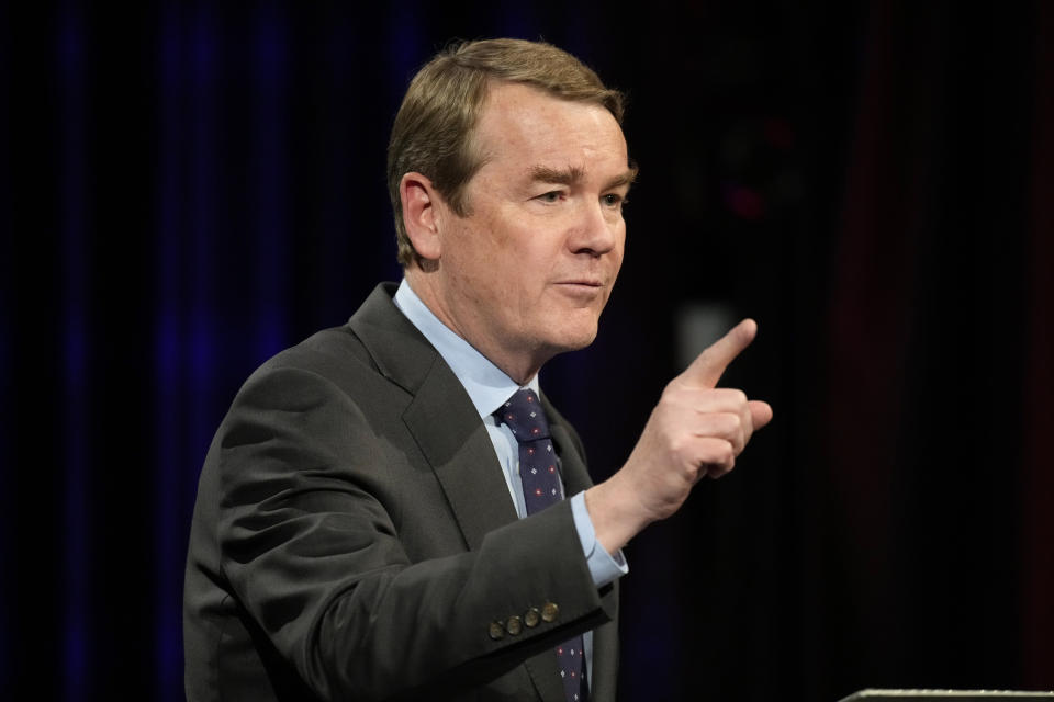 Democratic U.S. Sen. Michael Bennet makes a point during a debate with Republican challenger Joe O'Dea, Friday, Oct. 28, 2022, on the campus of Colorado State University in Fort Collins, Colo. (AP Photo/David Zalubowski)