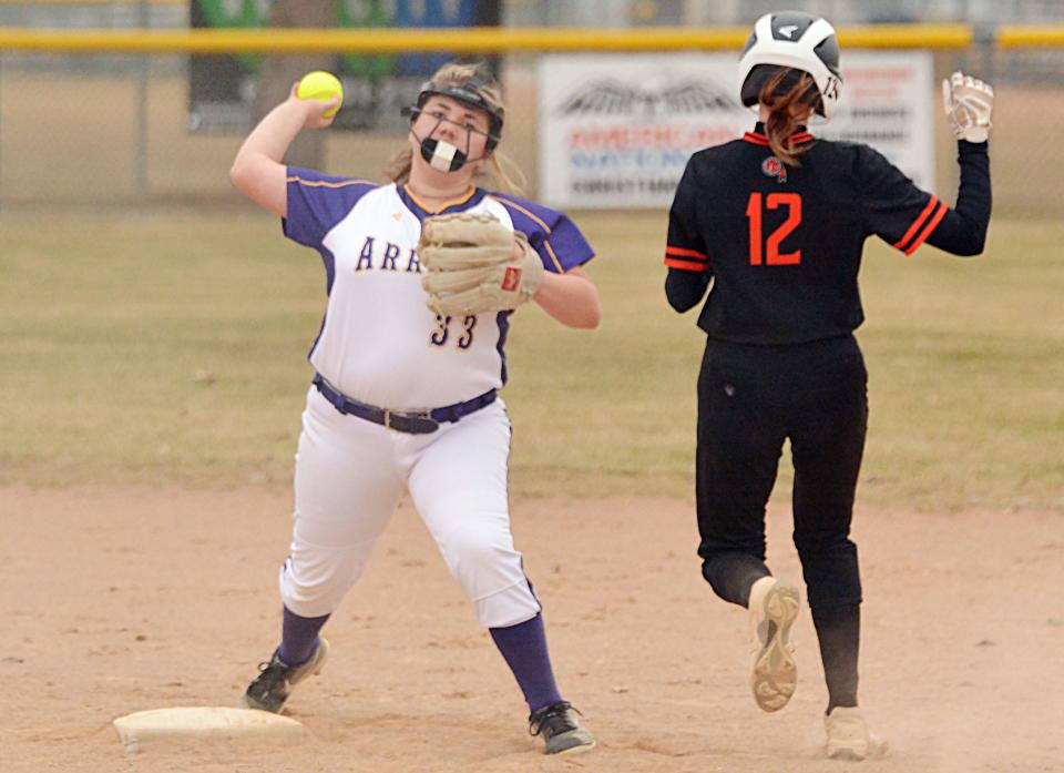 Watertown second baseman Alayna Dettman throws to first after forcing  out Sioux Falls Washington's Jacey Hayen during their high school softball game on Tuesday, April 18, 2023 at Koch Complex.