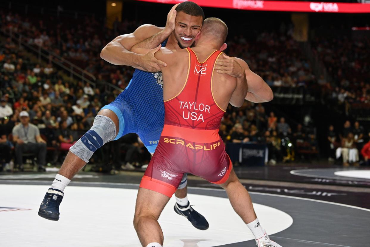 Aaron Brooks, left, and David Taylor wrestle at Final X on Saturday in Newark, N.J., competing for a spot on Team USA for the 2023 world championships.