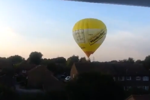 Wonderbra hot air balloon crash-lands in residential street in Surrey