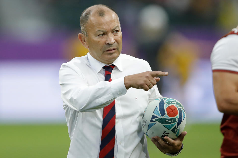 England's coach Eddie Jones gestures ahead of the Rugby World Cup quarterfinal match against Australia at Oita Stadium in Oita, Japan, Saturday, Oct. 19, 2019. (AP Photo/Christophe Ena)