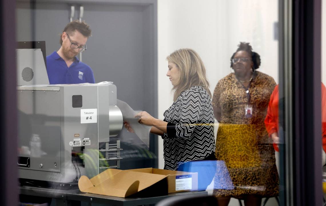 Absentee ballots are scanned during a Wake County Board of Elections board meeting at the operations center in Raleigh, N.C., Tuesday, May 7, 2024. Ethan Hyman/ehyman@newsobserver.com