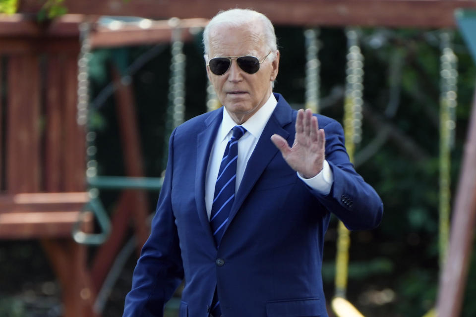 President Joe Biden waves to the media as he walks to board Marine One, Monday July 15, 2024, on the South Lawn of the White House in Washington, enroute to Andrews Air Force Base and onto Las Vegas. (AP Photo/Jacquelyn Martin)