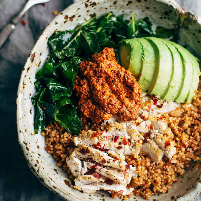 <p>At the intersection of clean eating and utter deliciousness, you'll find this tasty chicken-and-quinoa bowl that includes a healthy helping of avocado.</p><p><strong>Get the recipe at </strong><strong><a rel="nofollow noopener" href="http://pinchofyum.com/marinated-kale-and-chicken-bowls-with-sun-dried-tomato-sauce " target="_blank" data-ylk="slk:Pinch Of Yum;elm:context_link;itc:0;sec:content-canvas" class="link ">Pinch Of Yum</a>.</strong></p>