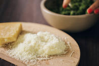 <p>A little Parmesan goes a long way in terms of adding flavor to dishes, while delivering calcium and protein. Two tablespoons is only 45 calories, according to Zuckerbrot.</p><p><i>(Photo: Stocksy)</i><br></p>