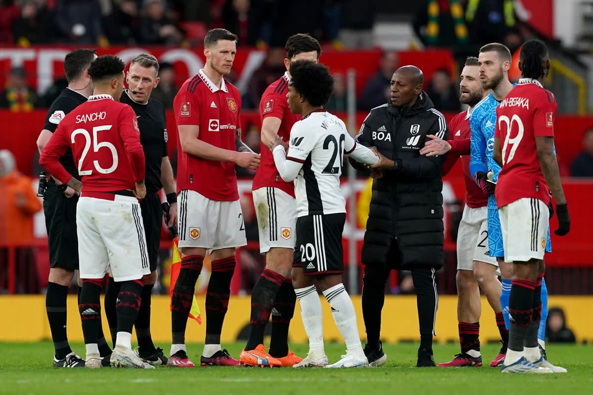 Manchester United have been fined after their players surrounded referee Chris Kavanagh in the FA Cup win over Fulham (Martin Rickett/PA) (PA Wire)