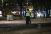 Police are seen in the area after several people were attacked in Vetlanda, Sweden, Wednesday, March 3, 2021. Swedish police say a man has assaulted at least eight people in a southern Sweden town, and that the case was being investigated as ”a suspected terrorist crime.” Police said a man in his 20s attacked people in the small town of Vetlanda, about 190 kilometers (118 miles) southeast of Goteborg, Sweden’s second largest city. (Mikael Fritzon/TT News Agency via AP)