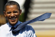 WASHINGTON, DC - JUNE 08: The wind picks up U.S. President Barack Obama's tie as he walks back to the Oval Office after welcoming the National Football League Super Bowl champions New York Giants to the White House June 8, 2012 in Washington, DC. The Giants defeated The New England Patriots 21-17 to win Super Bowl XXXXVI. (Photo by Chip Somodevilla/Getty Images)