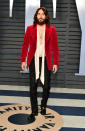 <p>Never one to go with a standard suit, <em>Vanity Fair</em> party attendee Jared Leto channeled Jim Morrison. (Photo: Dia Dipasupil/Getty Images) </p>