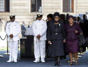 <p>Winnie Mandela, second from right, ex-wife of former South African President Nelson Mandela, views his coffin as he lies in state at the Union Buildings in Pretoria, Dec. 11, 2013. (Photo: Kim Ludbrook/Pool/Reuters) </p>