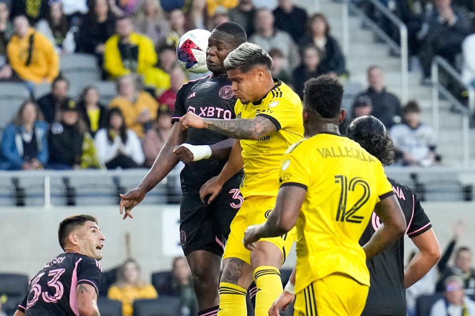 Apr 29, 2023; Columbus, Ohio, United States;  Columbus Crew forward Cucho Hernandez (9) and Inter Miami defender Kamal Miller (31) fight fo the ball during the first half of the MLS soccer game between Columbus Crew and Inter Miami at Lower.com Field on Saturday night. Mandatory Credit: Joseph Scheller-The Columbus Dispatch
