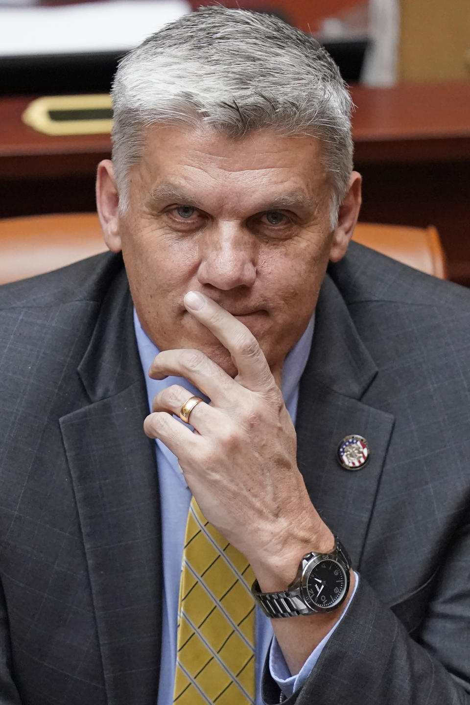 Republican state Rep. Phil Lyman looks on from the Utah House floor, Monday, Feb. 27, 2023, at the Utah State Capitol, in Salt Lake City. A push to mandate that members of religious clergy report child sexual abuse when it's brought to their attention is facing pushback from churches throughout the United States. That's the case in Utah, where four separate proposals to narrow the so-called clergy-penitent privilege loophole have not received hearings in the statehouse as lawmakers prepare to adjourn for the year. (AP Photo/Rick Bowmer)