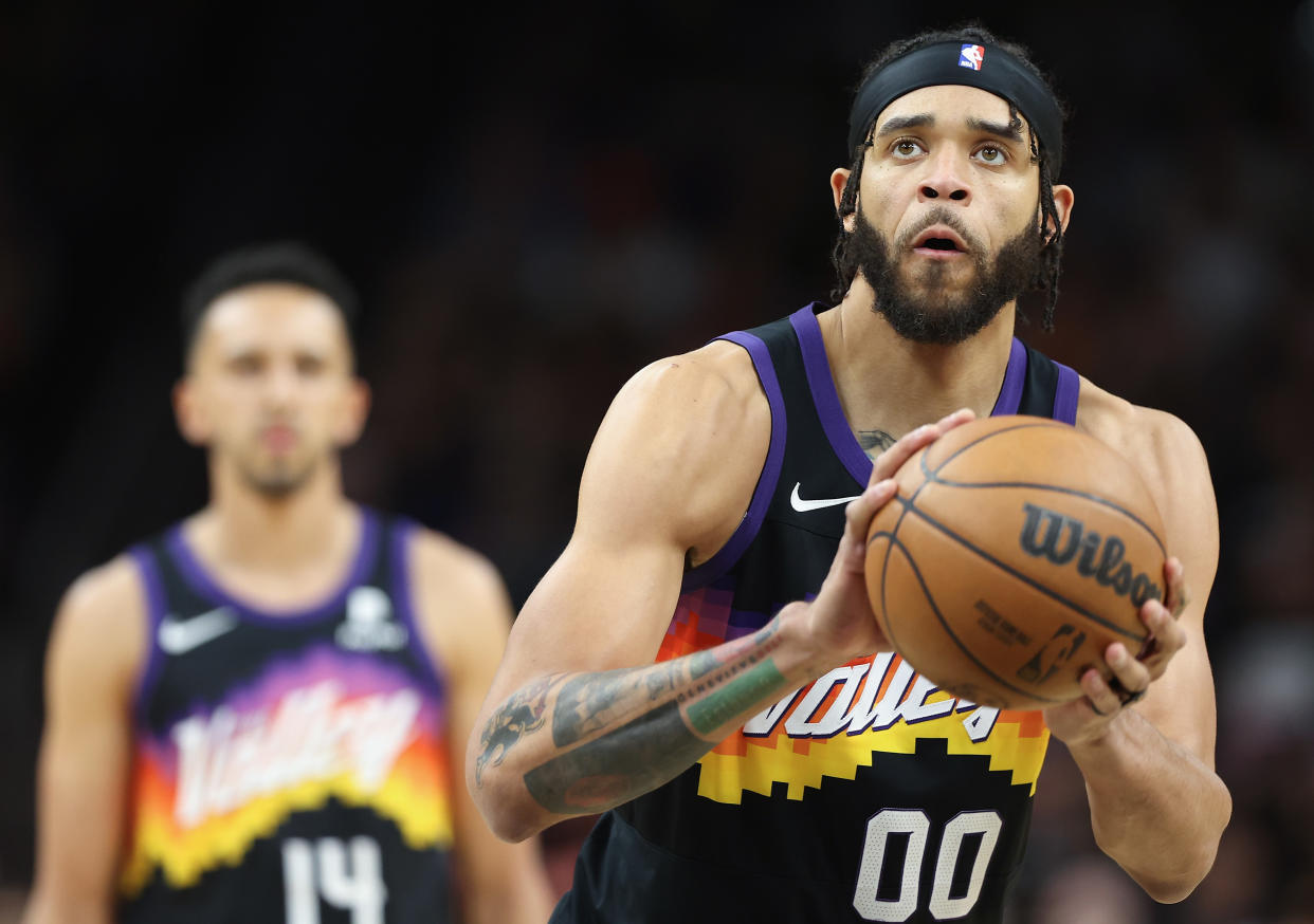 JaVale McGee of the Phoenix Suns takes a free-throw shot during the second half of Game Two of the Western Conference First Round NBA Playoffs at Footprint Center on April 19, 2022 in Phoenix, Arizona.  The Pelicans defeated the Suns 125-114.