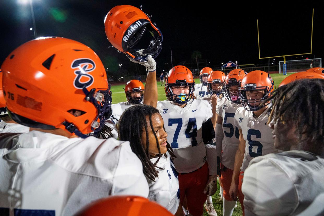 Benjamin players get ready to play Cardinal Newman in their regional semifinal playoff football game in West Palm Beach on November 17, 2023.