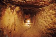 <p>The narrow access corridors that run throughout the Pyramids are barely wide enough for a person to crawl through. Would you enter a shaft? </p>