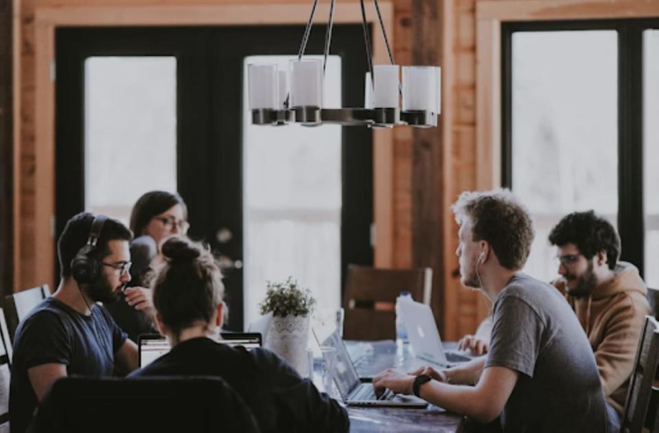 Employees At A Meeting