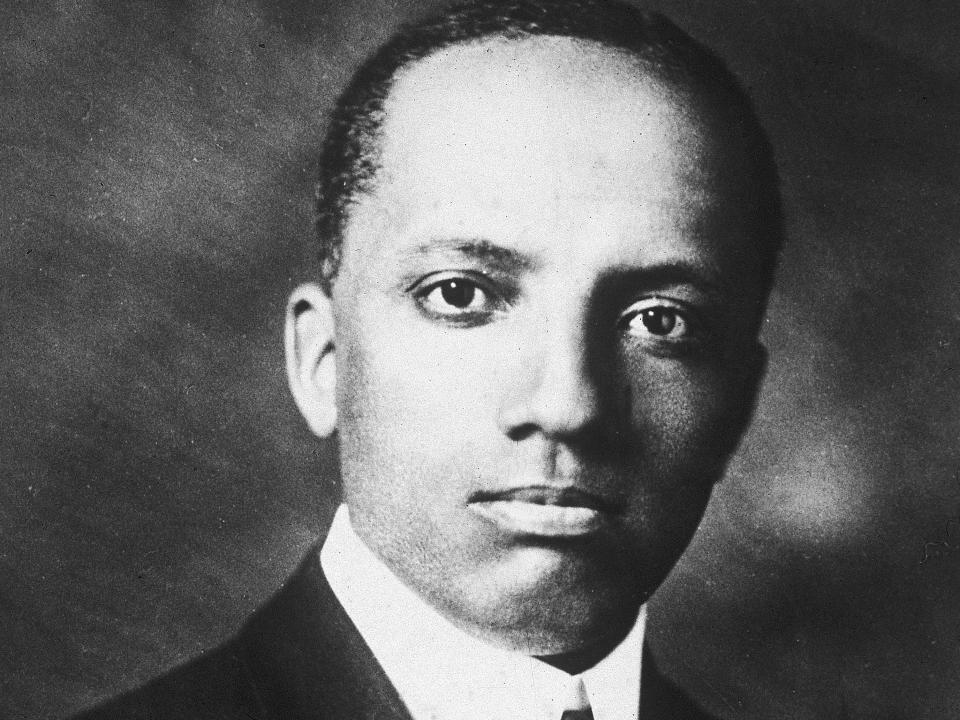 Black and white portrait of Carter Woodson