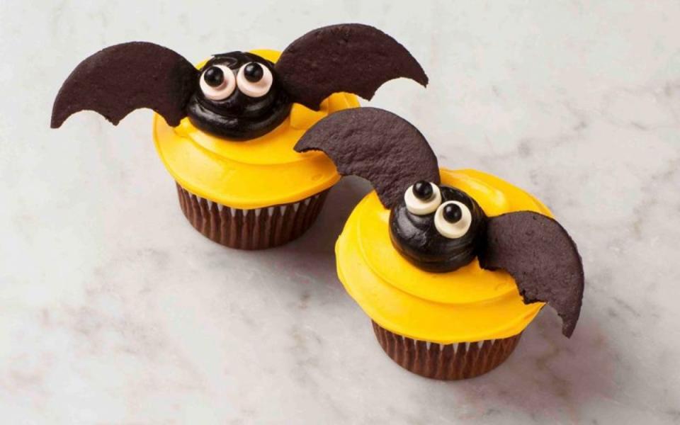 <p>Alan Richardson</p><p>Start with chocolate cupcakes and add a simple homemade cream cheese frosting and black pearl candies for a cute treat the kids might want even more than candy.</p><p><strong>Get the recipe: <a href="https://parade.com/1097323/parade/bat-cupcakes-halloween-recipe/" rel="nofollow noopener" target="_blank" data-ylk="slk:Bat Cupcakes;elm:context_link;itc:0;sec:content-canvas" class="link ">Bat Cupcakes</a></strong></p>