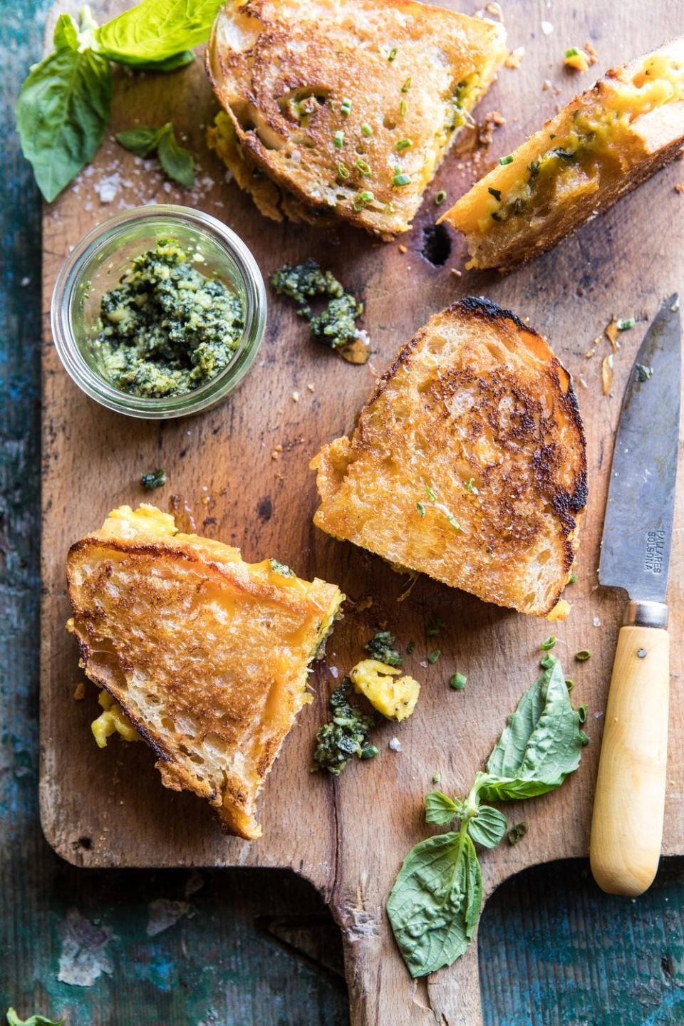 <strong>Get the&nbsp;<a href="https://www.halfbakedharvest.com/breakfast-grilled-cheese/" target="_blank">Breakfast Grilled Cheese with Soft Scrambled Eggs and Pesto</a>&nbsp;recipe from Half Baked Harvest</strong>