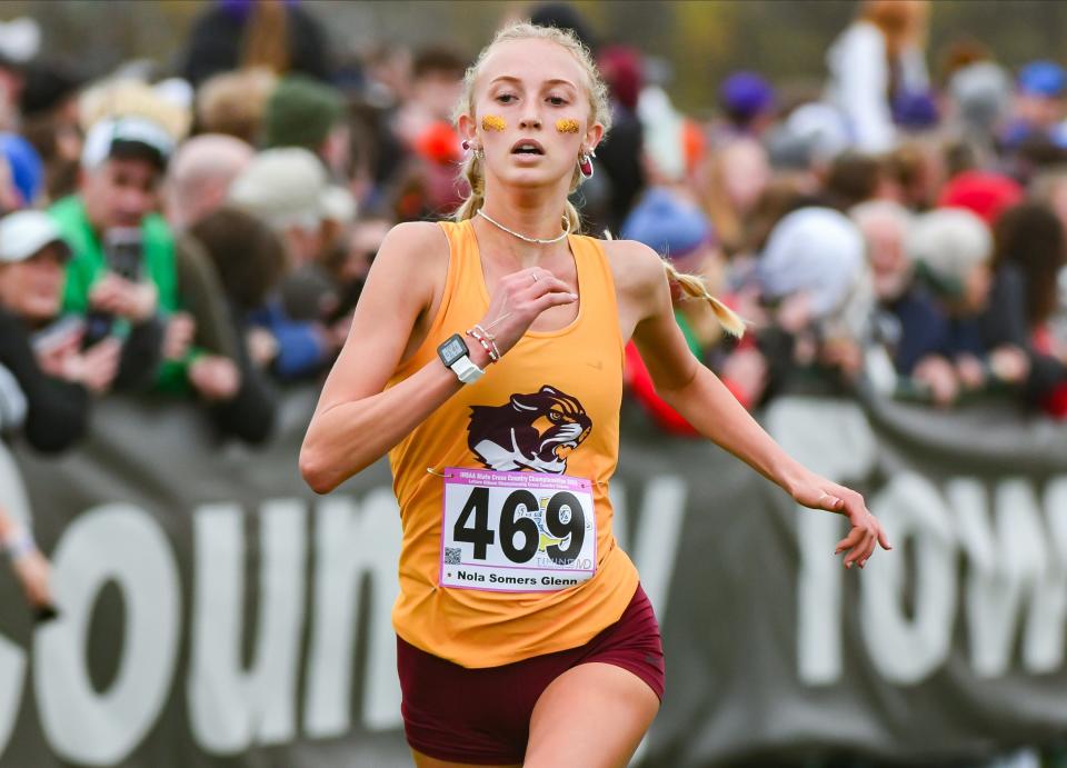 Bloomington North’s Nola Somers Glenn heads for the finish line during the IHSAA state cross country championship at the LaVern Gibson Championship Cross Country Course in Terre Haute on Saturday, Oct. 28, 2023.