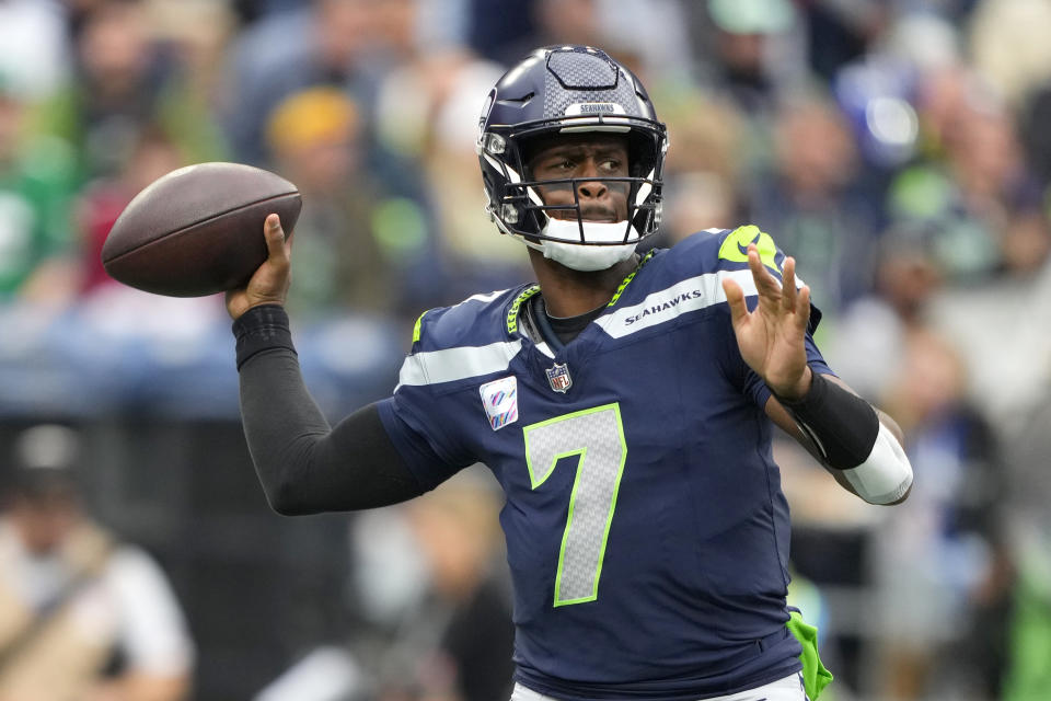 Seattle Seahawks quarterback Geno Smith throws a pass against the Arizona Cardinals during the second half of an NFL football game Sunday, Oct. 22, 2023, in Seattle. (AP Photo/Lindsey Wasson)