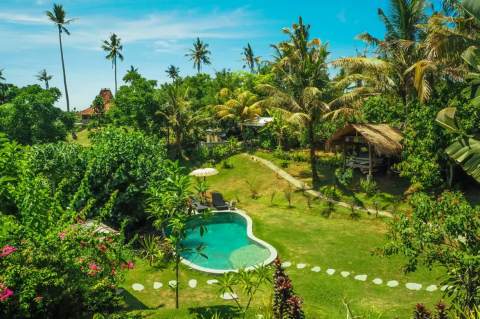 <p>Don't worry about packing snacks. Guests of this popular <span class="redactor-unlink">Airbnb rental</span> in Indonesia can roam the garden and pick fresh coconuts, papayas, and passion fruit during their island escape.</p><p><a class="link " href="https://www.airbnb.com/rooms/1016153" rel="nofollow noopener" target="_blank" data-ylk="slk:BOOK NOW;elm:context_link;itc:0;sec:content-canvas">BOOK NOW</a> <strong><em>Balian Treehouse</em></strong><br></p>