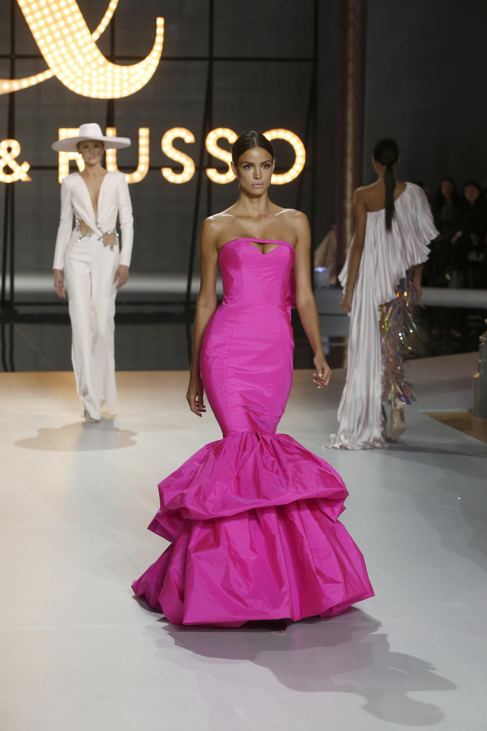 A model wears a creation for the Ralph & Russo Spring/Summer 2019 Haute Couture fashion collection presented in Paris, Monday Jan. 21, 2019. (AP Photo/Michel Euler)