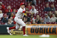 Cincinnati Reds' Joey Votto makes a throw to first base against the Washington Nationals during the eighth inning of a baseball game Thursday, Sept. 23, 2021, in Cincinnati. The Nationals beat the Reds 3-2. (AP Photo/Jay LaPrete)