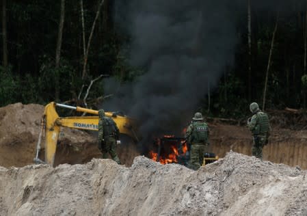 FILE PHOTO: Machines are destroyed at an illegal gold mine during an operation conducted by agents of the Brazilian Institute for the Environment and Renewable Natural Resources, or IBAMA, in national parks near Novo Progresso, southeast of Para state