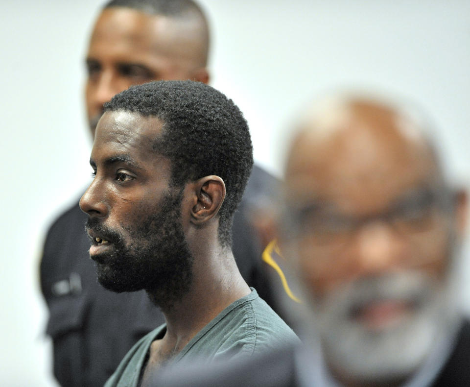 FILE - In this June 20, 2019 file photo, Deangelo Martin stands for a probable cause hearing, in Detroit. Murder charges could be announced against Martin suspected of killing at least four women and stowing their bodies in vacant houses in Detroit. Wayne County Prosecutor Kym Worthy is expected Wednesday, Sept. 18, to discuss the case against 34-year-old Martin. (Todd McInturf/Detroit News via AP, File)