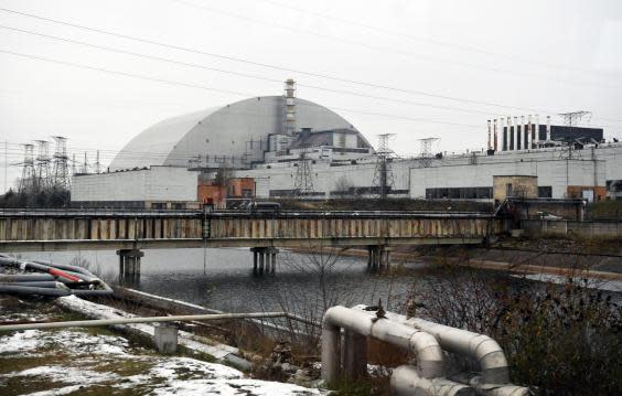 The New Safe Confinement sarcophagus covering the fourth block of the Chernobyl nuclear power plant in 2018 (Sergei Supinsky/AFP via Getty Images)