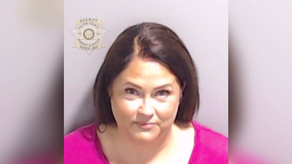 A booking photo shows former election supervisor Misty Hampton, who is a familiar face to voters in Coffee County. - Fulton County Sheriff's Office