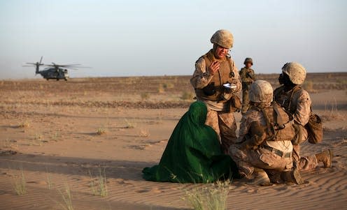 <span class="caption">US marines with a female engagement team in southern Helmand province, Afghanistan, in May 2012.</span> <span class="attribution"><a class="link " href="https://www.dvidshub.net/image/654340/aerohunter-aif-iso-rct-5" rel="nofollow noopener" target="_blank" data-ylk="slk:Cpl. Meghan Gonzales/DVIDS;elm:context_link;itc:0;sec:content-canvas">Cpl. Meghan Gonzales/DVIDS</a></span>