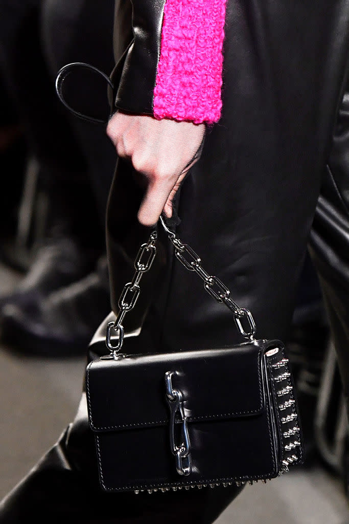 <p>A black, boxy bag with studs from the Alexander Wang FW18 show. (Photo: Getty Images) </p>